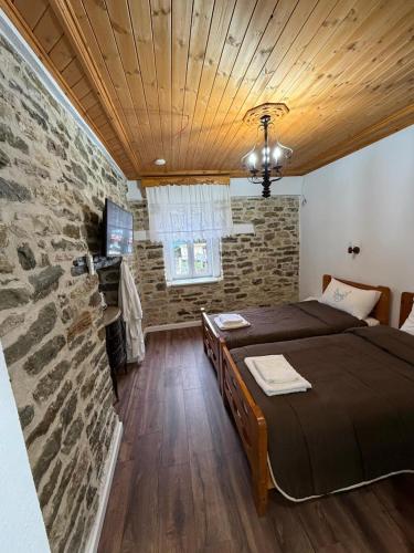 Llit o llits en una habitació de Vila Drasa