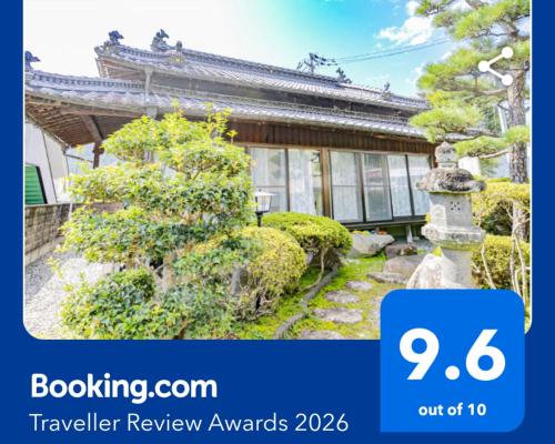an image of a house with a sign that reads travel review awards at Minka -STAY century old Traditional Japanese house in Miyoshi