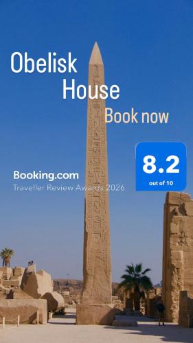 a sign that reads obelisk house book now at Obelisk house in Jazīrat al ‘Awwāmīyah