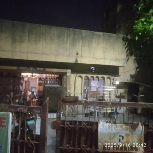 a view of a restaurant at night at Balaji Shridham in Jāmb