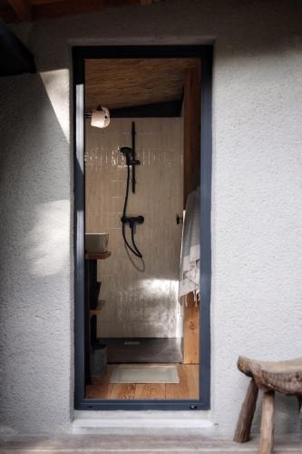 a view of a room through a window at Lodge La Clède in Concoules