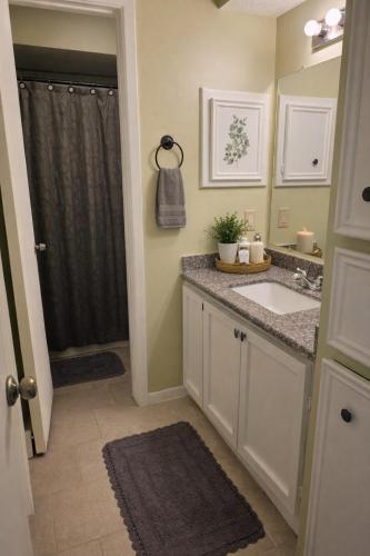 a bathroom with a sink and a shower at Fresh Crash Pads 4-Affordable Shared Housing in Houston