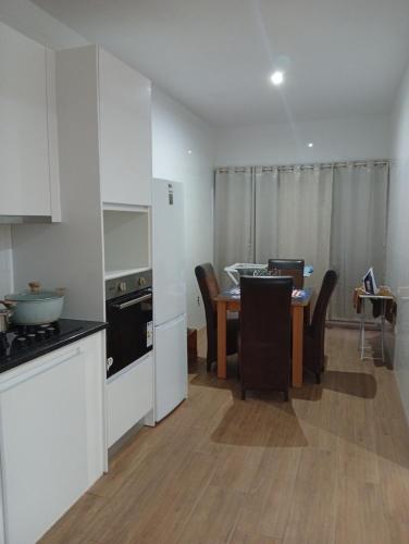 Кухня или кухненски бокс в T&S Guest House