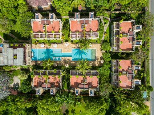 an overhead view of a house with a pool at Villa Mandhari - Diani Beach in Diani Beach