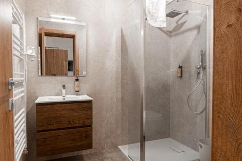 a bathroom with a shower and a sink at Manfredomus in Mussomeli