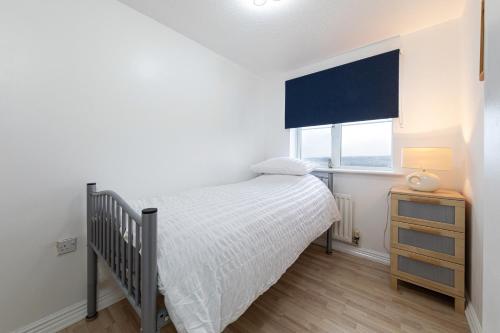 a bedroom with a bed and a window at Valley View in Shield Row