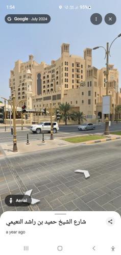 a screenshot of a screenshot of a street in a city at Nice room inside sea view apartment in Ajman