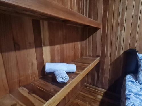 a sauna with a roll of towels on a shelf at Casa Las Brisas in Nicoya