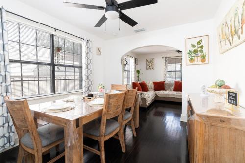 a dining room and living room with a table and chairs at Hidden Gem Near Plaza Mall - Mi Casita McAllen in McAllen