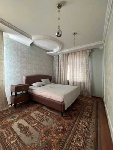 Llit o llits en una habitació de Квартира