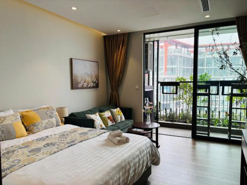 a bedroom with a bed with a teddy bear on it at Măng Homestay in Xuân Quan