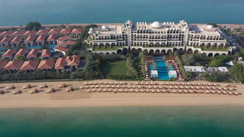 an aerial view of a resort on the beach at Zabeel Saray Royal Residences Lagoon Villa in Dubai