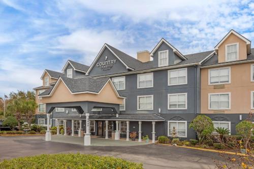 a rendering of the front of a hotel at Country Inn & Suites by Radisson, Jacksonville - Orange Park in Orange Park
