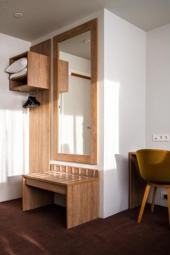 Kuchyň nebo kuchyňský kout v ubytování Bø Hotel