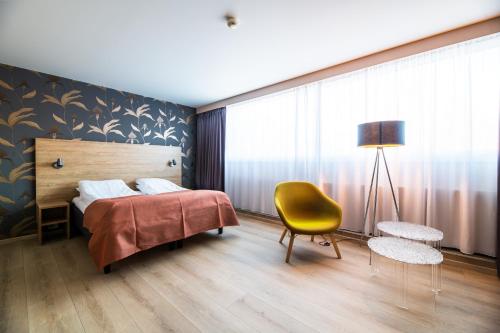 Postel nebo postele na pokoji v ubytování Bø Hotel