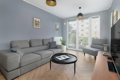 Elegant Apartment in Poznan for Remote Work with Parking and Balcony by Noclegi Renters