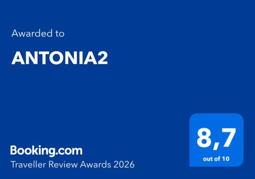 a blue square with the text awarded to amazonia travel review awards at ANTONIA2 in Brides-les-Bains