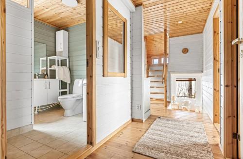 a bathroom with a toilet and a sink at Look at this view! 3 BR house overlooking Hardangerfjorden in Kvam