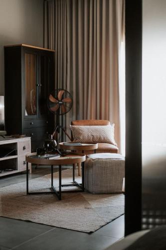 a living room with a couch and a coffee table at IBella's at The Urban in Pretoria