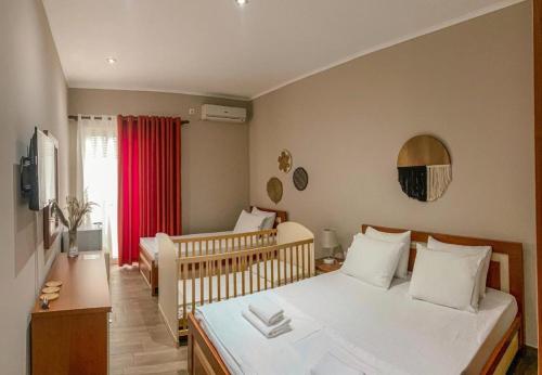 Postel nebo postele na pokoji v ubytování Kleanthi`s Hotel