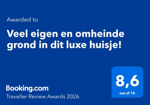 a screenshot of a cell phone with the text upgraded to yetlezlez an umbrella at Veel eigen en omheinde grond in dit luxe huisje! in Wateren
