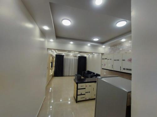 an office with a desk in a room with lights at الاقصر in Luxor
