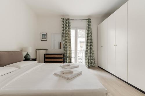 GuestHost - Bright Flat near Stazione Centrale