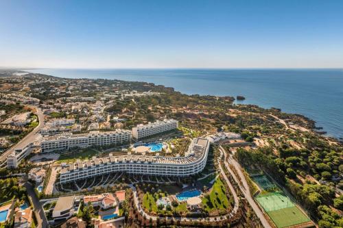 an aerial view of a resort next to the ocean at W Residences Algarve in Albufeira
