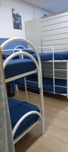 a room with two bunk beds in a hospital at I Love Host 24 in Montefiascone