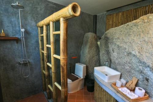 a bathroom with a shower and a sink at Sai Daeng Resort in Koh Tao