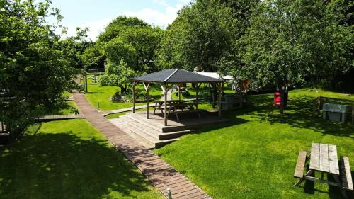 an overhead view of a park with a picnic shelter at Orchard Hideaways, Penrith, The Lake District in Penrith