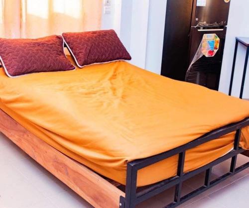 Postel nebo postele na pokoji v ubytování Appartement Ouaga 2000