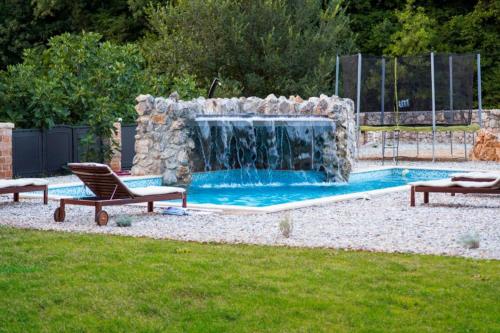 Viletta with pool, waterfall, privacy, large garden - by Traveler tourist agency Krk - ID 2212