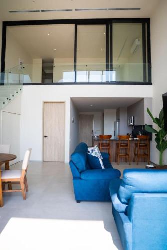 Zona d'estar a Oceanview Greco Loft