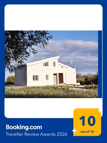 a picture of a white house at I Secolari di Giulia in Avola