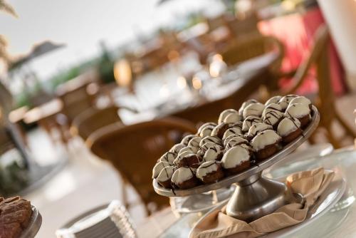 a tray of chocolate cookies and marshmallows on a table at Tamaca Beach Resort in Santa Marta