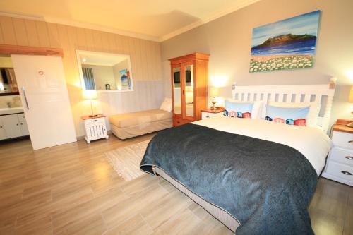 Ένα ή περισσότερα κρεβάτια σε δωμάτιο στο Bay View Guest House