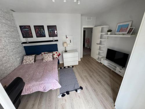 Habitación en el centro con balcón