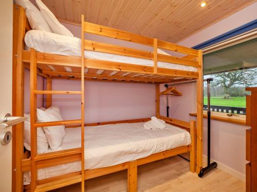 a bunk bed room with two bunk beds in a cabin at Finest Retreats - Oasis 41 in Fritton