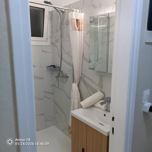a bathroom with a shower and a sink at Evdoxia - Piccola Casa Corfu Town in Ágios Rókkos