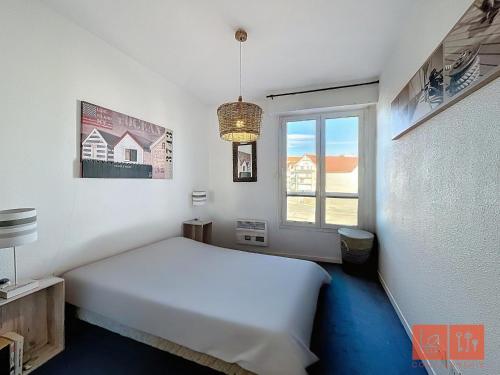 Llit o llits en una habitació de Le soleil couchant