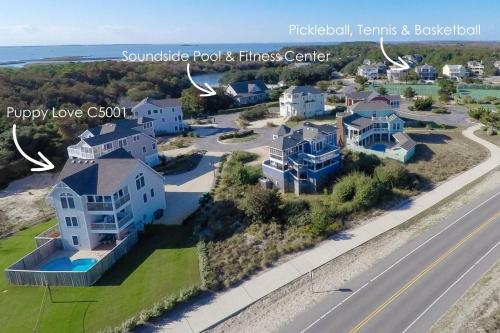an aerial view of a house at Puppy Love - Corolla, Villages at Ocean Hill, Pool, Hot Tub, Nearby Amenities, Lighthouse, Pets OK in Corolla