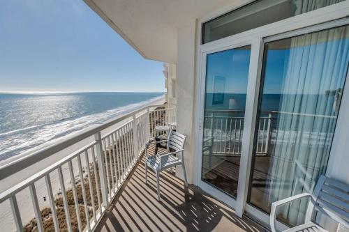a balcony with a view of the ocean at Baywatch Renovated, Unobstructed Oceanfront Views in Myrtle Beach