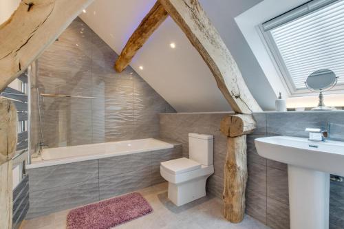 a bathroom with a shower toilet and a sink at 4 Bed in Bala oc-bow66 in Bala