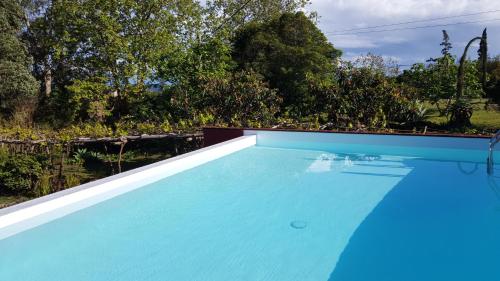 The swimming pool at or close to Casa Do Populo