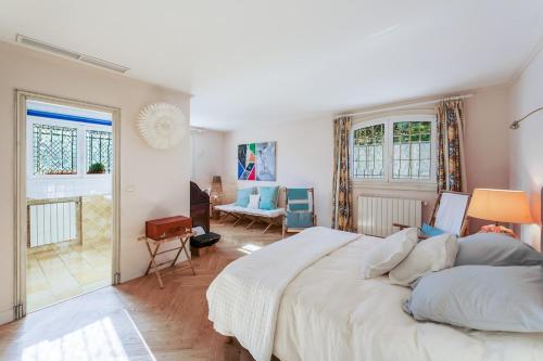 Llit o llits en una habitació de Villa Thalia