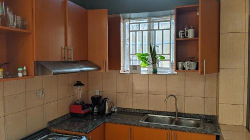 Cuina o zona de cuina de Akagera Sunset House