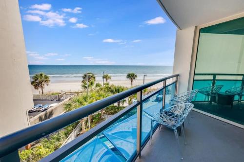 a balcony with a view of the beach at Seaside condo w hot tub & private balcony in Myrtle Beach