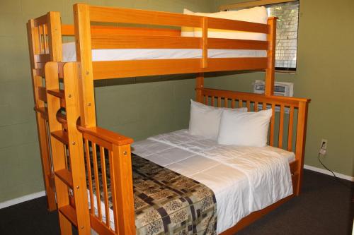 a couple of bunk beds in a room at Big Pines Mountain House in South Lake Tahoe