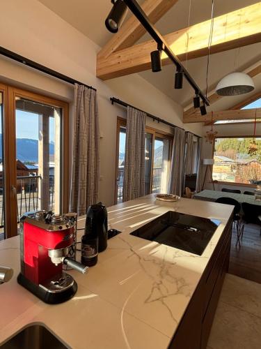 a kitchen with a mixer on a counter in a room at Eco-Chalet Matschiedl in Tratten